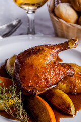 Grilled duck leg on the bone