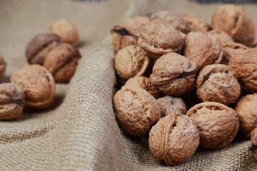 fresh macro walnuts on burlap