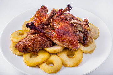 Grilled duck leg on the bone