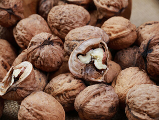fresh macro walnuts on burlap