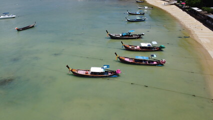 Obraz premium Rawai Beach lies at the southernmost tip of Phuket. This west-facing beach is very pleasant, with plenty of trees providing shade. 