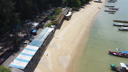 Rawai Beach lies at the southernmost tip of Phuket. This west-facing beach is very pleasant, with plenty of trees providing shade. 