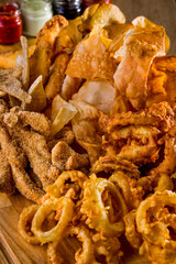 Corn chips, onion rings, fish in batter