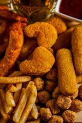 French fries, cheese balls, deep-fried chicken legs, chicken nuggets, wing