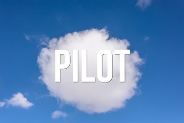 PILOT - word on the background of the sky with clouds.