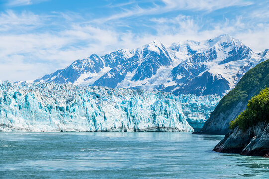 A view of the end of the Hubbard Glacier from  Disenchartment Bay stretching into Russell Fjord, Alaska in summertime