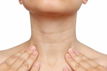 Cropped shot of a young woman touching her neck with her hands isolated on a white background. Lines on the female neck. Wrinkles, age-related changes, rings of Venus, goosebumps - obrazy, fototapety, plakaty