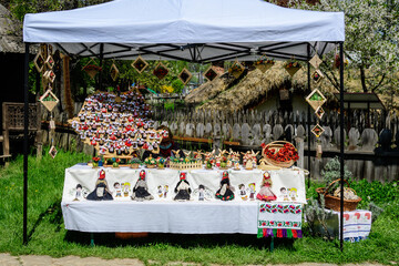 Traditional Romanian hand made decorative products displayed for sale at a hand made festival in...