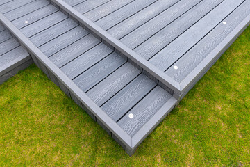 New Laid Composite Decking Ash Colour and with Decking Lights Installed.