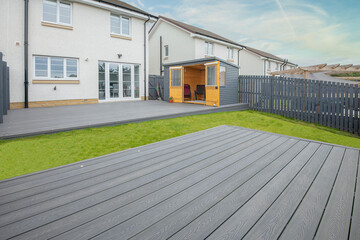 New Laid Composite Decking Ash Colour and with Decking Lights Installed.