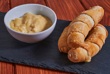 tequeños on a plate