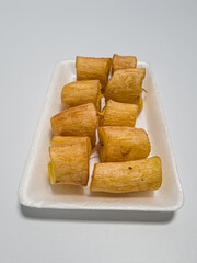 The food from the village, which is fried cassava, is crunchy and tasty