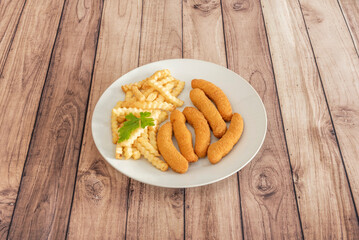 Chicken fingers are prepared by covering the chicken meat with a mixture of breading and frying. Traditionally, chicken strips are mainly white meat,