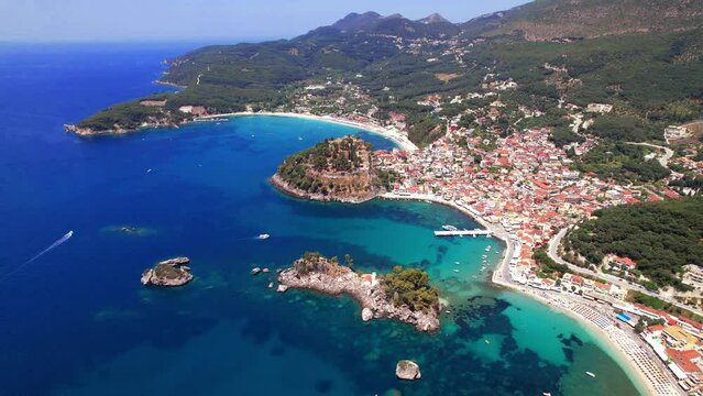 Aerial drone video of Parga colorful town and popular tourist resort in Epirus with beautiful beaches, Greece