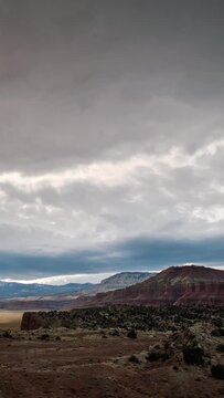 Time lapse of clouds rolling in the sky over the Utah desert looking towards Thousand Lake Mountain.