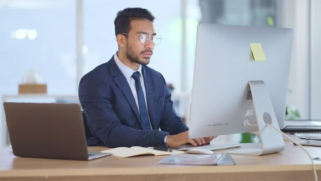 Financial trader typing on computer keyboard, thinking and investing in stock trade or hedge fund business. Confident professional finance advisor analysing profit and loss projections on technology