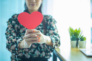 woman holding red heart  health insurance  donation  happy charity volunteer concept  world heart...