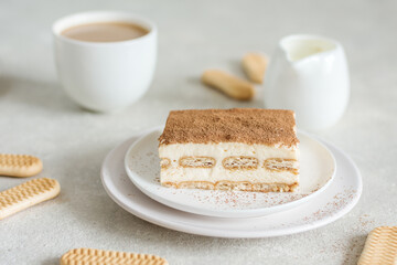 Dessert tiramisu close up, background in blur
