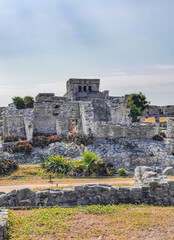 Ancient Tulum ruins Mayan site temple pyramids artifacts seascape Mexico.