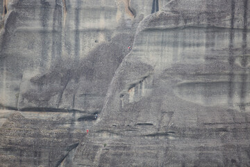 Rock climbers on the huge rock pillars formation of Meteora, Kalabaka, Greece