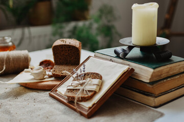Fototapeta na wymiar black bread on rustic table