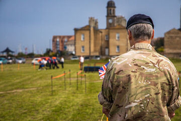 Armed Forces Day Soldier looking on field