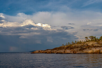 Nature of Karelia. View of the sea and rocks. Summer trip to the north.