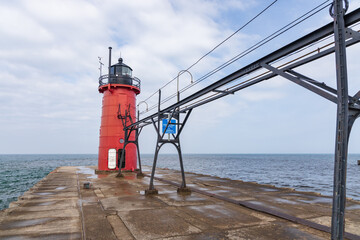 Fototapeta na wymiar South Haven Pier Lighthouse, elevated walkway and breakwater, South Haven, Michigan