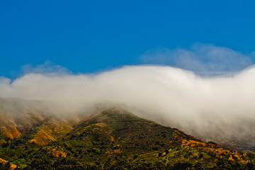 Fog rolling  into San Bruno Mt. California summer