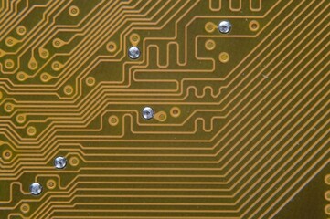 microprocessor on the background of the microcircuit of the motherboard.