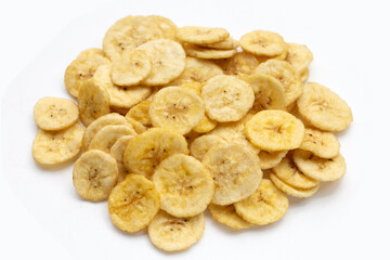 Banana slice chips on white background.