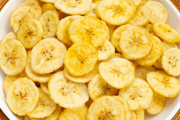 Banana slice chips in plate