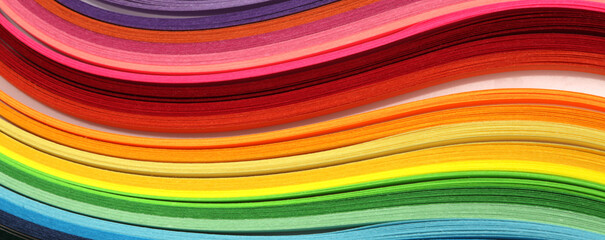 Abstract gradient rainbow color wave curl strip paper horizontal long background.