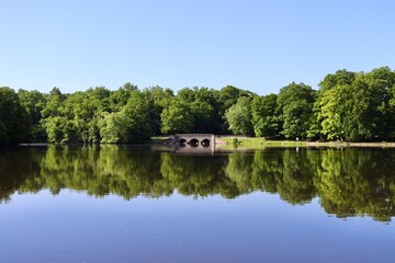 The calm peaceful lake in the countryside.
