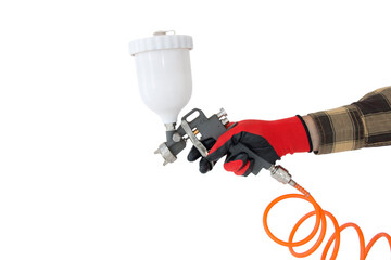 paint sprayer in the hand of a worker, close up on an isolated white background