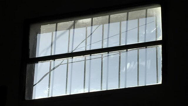 The Clear Sky Seen Through the Window of Jail Cell of the Old Olmos Prison in Buenos Aires Province, Argentina. Close Up.