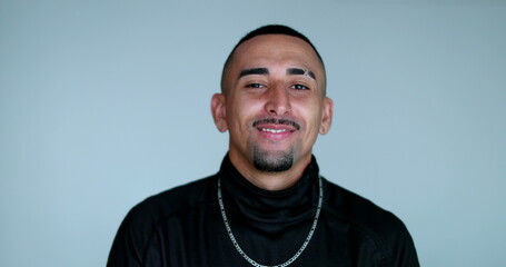 Portrait happy hispanic south american man smiling