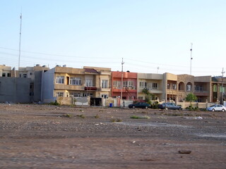 Fototapeta na wymiar Row of colorful houses in Erbil, Kurdistan, Iraq