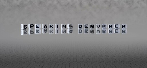 speaking demurrer word or concept represented by black and white letter cubes on a grey horizon...