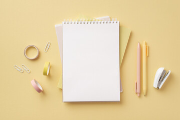 Back to school concept. Top view photo of school accessories open notepad pens clips stapler and...
