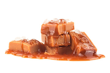 Salted toffee candies with caramel sauce isolated on a white background. Salted caramel pieces....