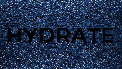 Word hydrated printed on the wet glass with blue drops on black background | hydrating concept