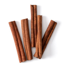 Cinnamon sticks isolated over white background closeup. Canella spice. Aromatic condiment background. Flat lay, top view.. - 518657439