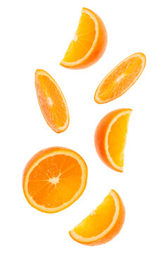 falling fresh orange fruit slices isolated over white background closeup. Flying food concept. Top view. Flat lay. Orange slice in air, without shadow..