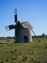 Stone windmill in a field