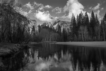 Grayscale of river with a forest in the background in Half Dome, Yosemite National Park