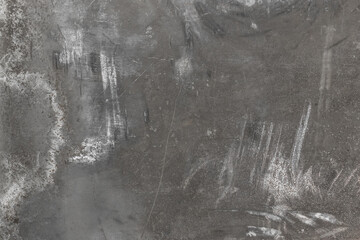 Dirty streaks of white and gray paint on the surface of old metal abstract steel pattern texture background grunge