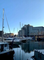 London, England, UK. View of the St Katherine Docks Marina. This is Central London's only Marina and has 185 berths for yachts. This is also popular place for lunch with numerous restaurants