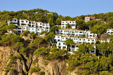 Obraz premium Spain,Tamariu. White houses formation on cliffs landscape nature