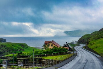 Bus driver's view through the windscreen driving the Faroe Islands tour route